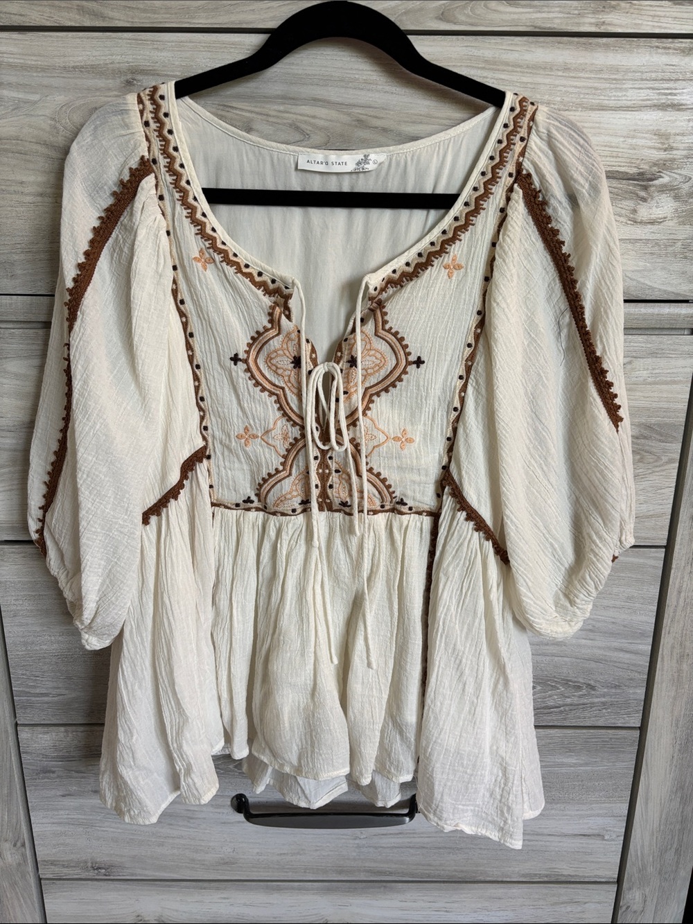 Altar'd State embroidered bohemian blouse with long puff sleeves.